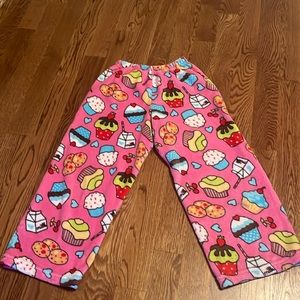 pink fuzzy pajama pants. cupcake design. good condion. cozy. kid size s